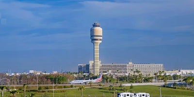 The control tower and people mover at Orlando International Airport.